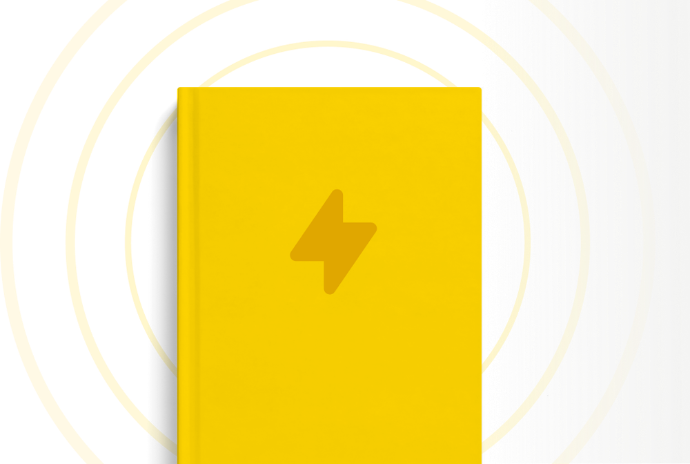 Ein gebundenes Buch in strahlendem Gelb mit einem Blitz darauf.